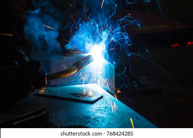 Worker welding construction by MIG welding, Worker welding the steel part by manual, welding splatter repairman, lifestyles, light weld - Powered by Shutterstock