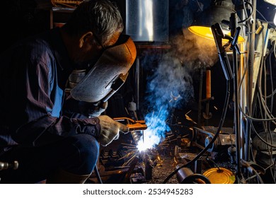 a worker who welds in an ironworks