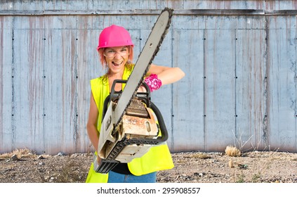 Worker Woman With Chainsaw