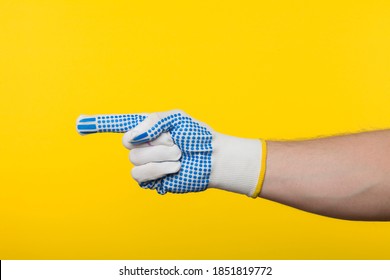 Worker work glove isolated on yellow background