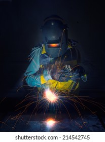 worker work hard with welding process in production plant