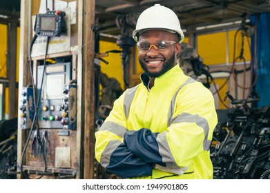 The Worker Working With Automation Robot In The Factory. The Concept Of Robotics, Manufacturing, Automotive And Industrial