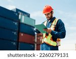 A worker working at container , Man worker managing the import and export container.