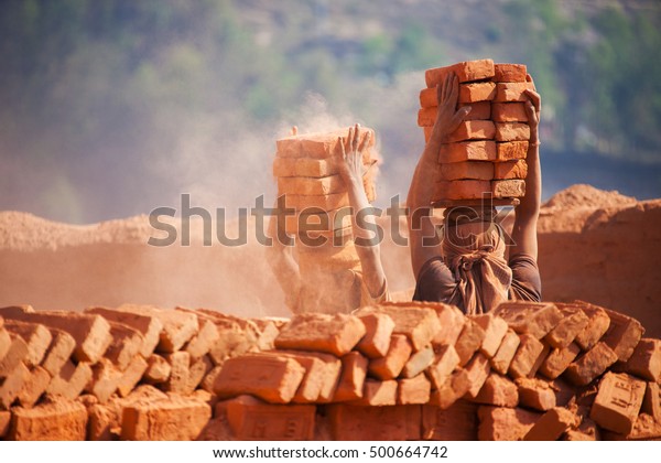 Workers in a brick\
factory