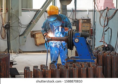 Workers Are Busy On The Production Line In An Agricultural Machinery Factory., Luannan County, Hebei Province, China.