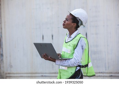 workers checking Containers box from Cargo freight ship on computer for import export. cargo container ship concept. Container Shipping Logistics Engineering of Import Export Transportation Industry
