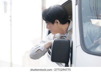 Workers checking their blind spots while driving safely, and images of commuting for delivery and transportation: “Back up!” Stay safe in the delivery industry, too. (Anonymous)