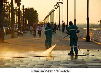 Workers Cleanse A Coastal Street In Beirut, Lebanon, Middle East. Mediterranean Sea. November 15, 2008.