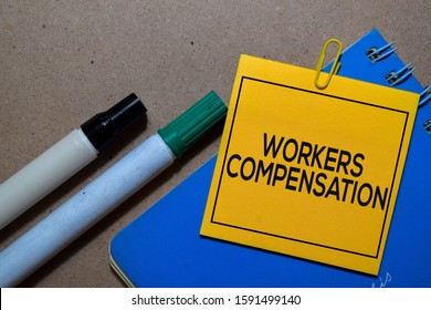 Workers Compensation Write On Sticky Notes Isolated On Office Desk