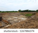 Workers are constructing dams to prevent flooding in the rainy season and keep water in the dry season.