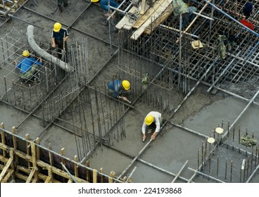 Workers In Construction Site, Elevated View