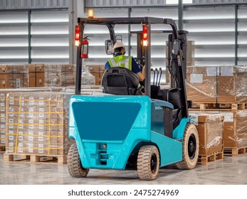 Workers drive forklifts and move products to be stored in warehouses. - Powered by Shutterstock