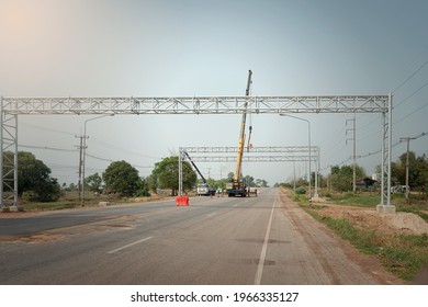 Workers Install Big Steel Billboard Over Highway