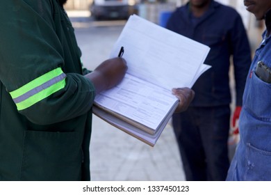 Workers With Job Hazard Analysis Book