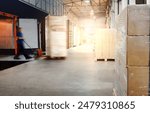 Workers Loading Pallets of Goods into A Truck Container. Loading Dock Warehouse at Night. Distribution Warehouse, Supply Chain, Supplies Shipment, Freight Truck Logistics, Cargo Transport.