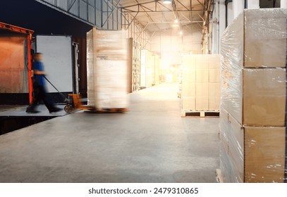 Workers Loading Pallets of Goods into A Truck Container. Loading Dock Warehouse at Night. Distribution Warehouse, Supply Chain, Supplies Shipment, Freight Truck Logistics, Cargo Transport.