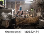 Workers are making knives
