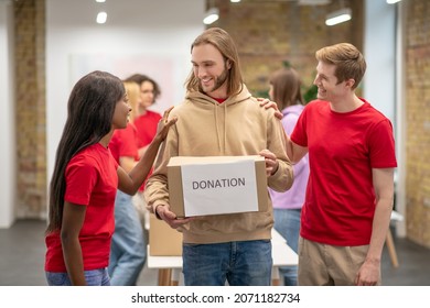 Workers Of The Non Profit Organization Distributing Donations