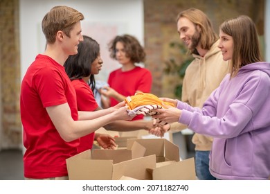 Workers of the non profit organization distributing donations