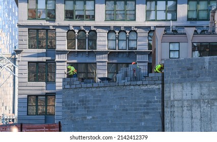 Workers On A Construction Site Form Brooklyn, New York. Construction Industry In USA, 2021.