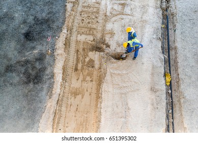 Workers On The Construction Site, Shot In Dubai, United Arab Emirates