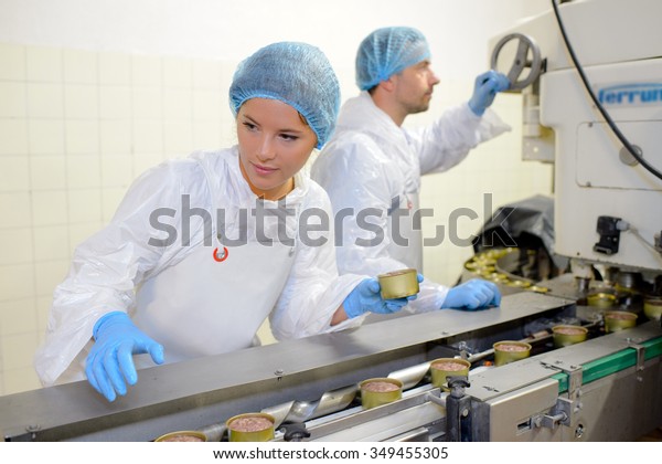 Workers on food production\
line