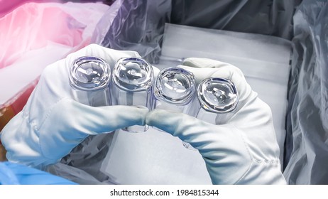 Workers Packing Cosmetic Plastic Bottle Caps, In  Plastic Injection Molding Factory.

