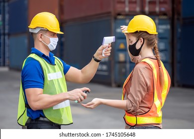 Workers With Protective Mask, Engineer Worker Waring Surgical Mask Checking Body Temperature Using Infrared Digital Thermometer Check Temperature Before Into Work Place