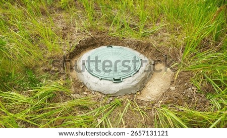 the workers put a trapdoor in the grass