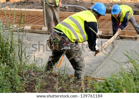 Workers in the road construction