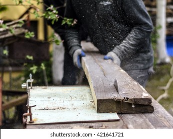 Workers At Saw Mill Cutting Wood