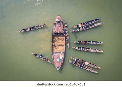 Workers Seen Collecting Coal From Jadukata River At Tahirpur In Sunamganj District In Bangladesh. 