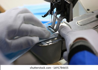 Workers Are Sewing Rope On Sewing Machines To Produce Surgical Masks