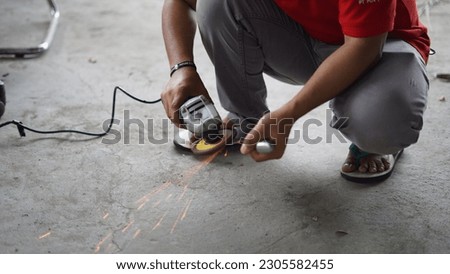 workers are sharpening their tools so that they are sharp again