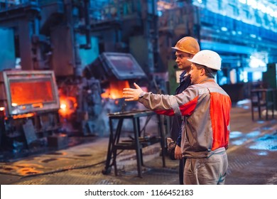 Workers In The Steel Mill.