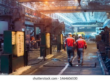 Workers In The Steel Mill.