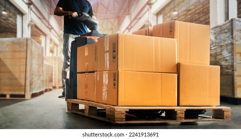 Workers Unloading Packaging Boxes on Pallet in Warehouse. Electric Forklift Loader. Cartons Cardboard Boxes. Supplies Shipping Warehouse. Supply Chain Shipment Goods. Distribution Warehouse Logistics	 - Powered by Shutterstock