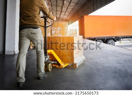Workers Unloading Packaging Boxes on Pallets into The Cargo Container Trucks. Loading Dock. Shipping Warehouse. Delivery. Shipment Goods. Supply Chain. Warehouse Logistics Cargo Transport.	 Сток-фото © 