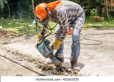 Workers Use Concrete Breaker Electric