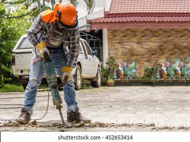 Workers Use Concrete Breaker Electric