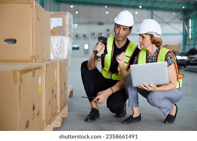 workers using barcode scanner in the warehouse storage