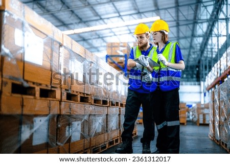 workers using Laser Barcode Scanner to checking stock items for shipping. male and female inspecting the store factory. industry factory warehouse. Logistics employees working at warehouse management.