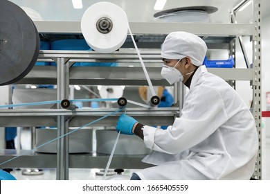 Workers are using polypropylene as a raw material to produce meltblown cloth for medical-surgical masks.