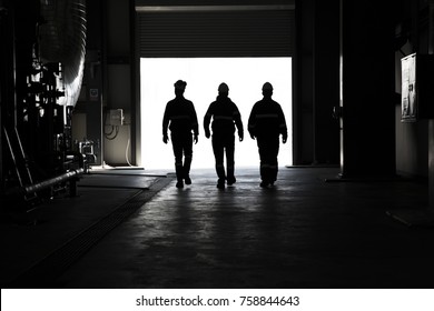  Workers Walking On Power Plant