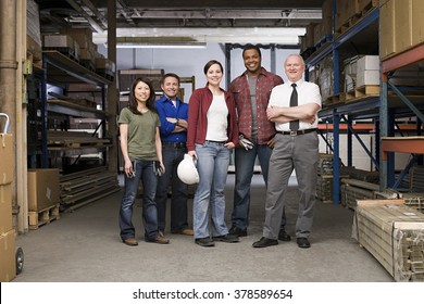 Workers in warehouse - Shutterstock ID 378589654