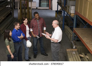 Workers In Warehouse