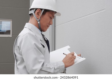 Workers who check the outer wall