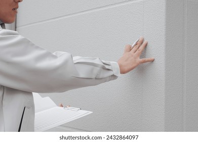 Workers who check the outer wall