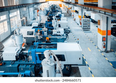 workers work in plastic household product making factory. plastic product making process in factory. injection mold and machine here to worker making household product. - Powered by Shutterstock