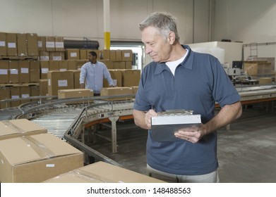 Workers working in distribution warehouse - Powered by Shutterstock - Get 15% off with code: PIKWIZARD15